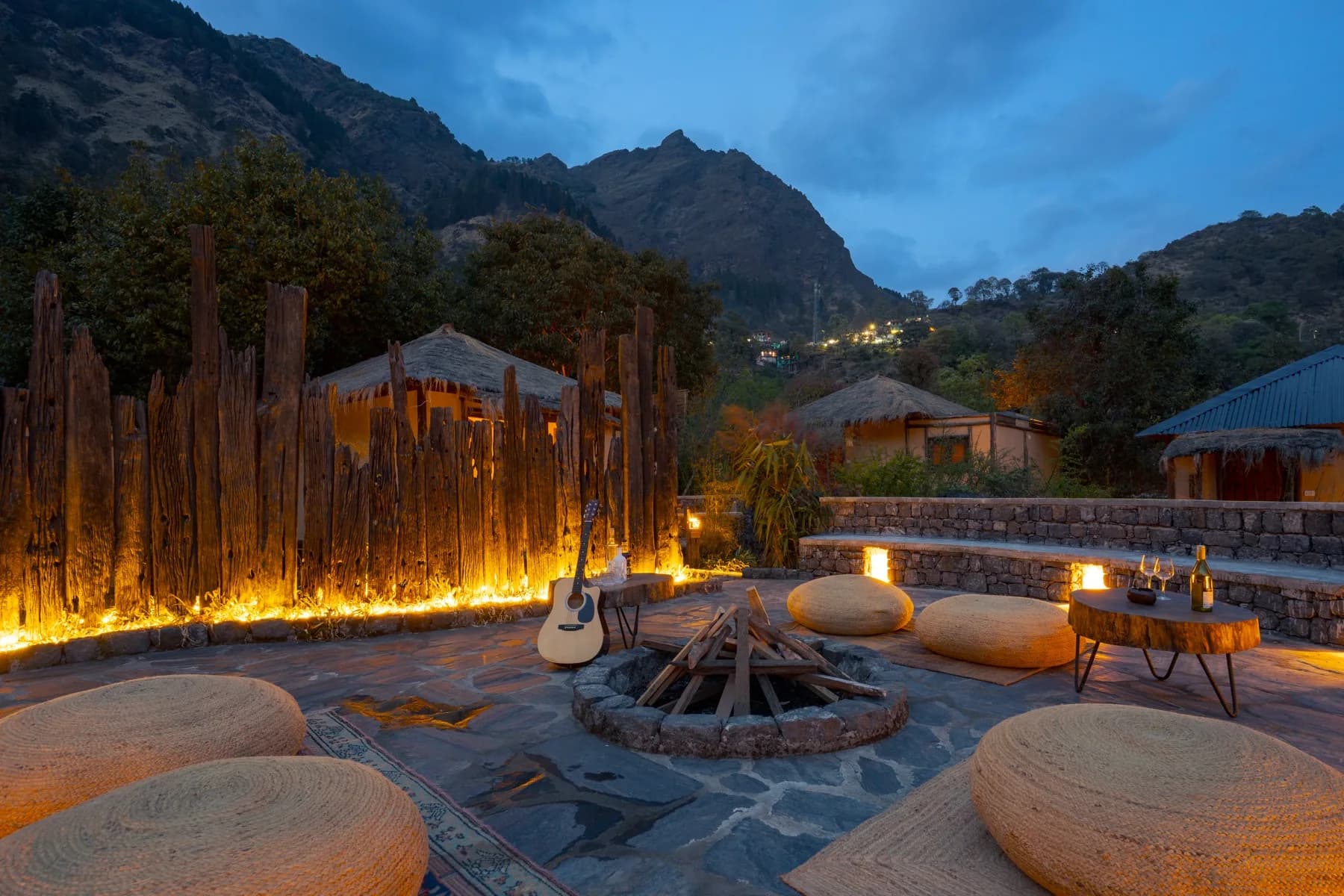 Evening bonfire and firepit at Kaansya Resort under a mountain sky